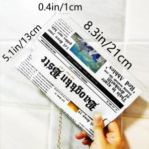 Clutch Newspaper Addict